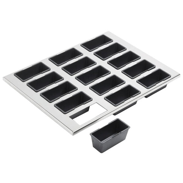 A black rectangular Matfer Bourgeat cake baking set with black molds in a black tray.