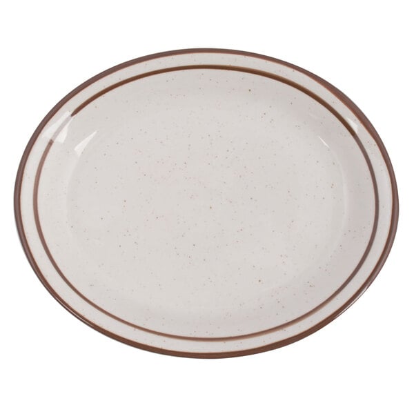 A white Tuxton china platter with a brown speckled narrow rim.