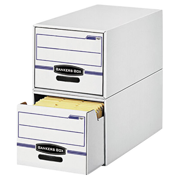 A white Fellowes file drawer storage box with blue plastic handles containing yellow files.