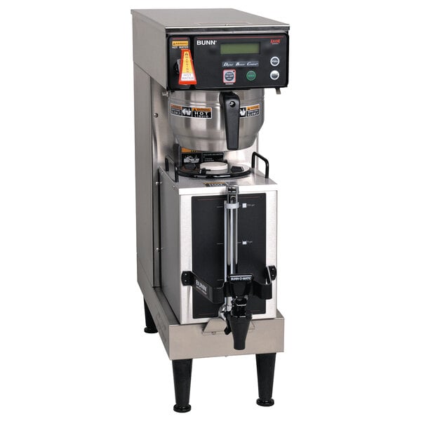 A Bunn AXIOM coffee brewer with a coffee machine on top.