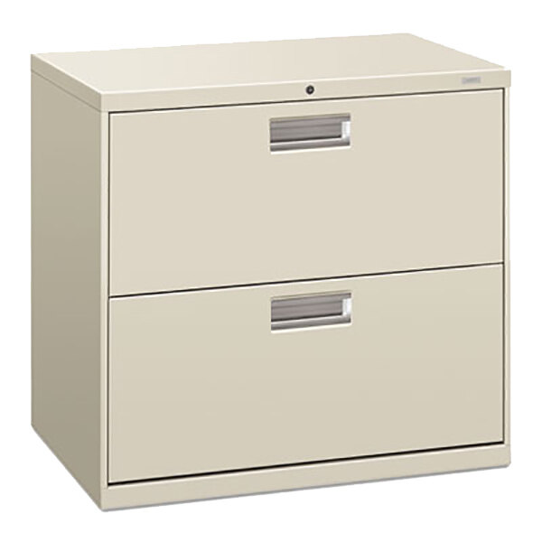 A light gray HON 2-drawer metal lateral file cabinet.