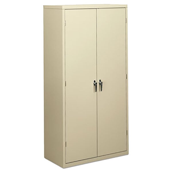 A putty Hon storage cabinet with two doors.