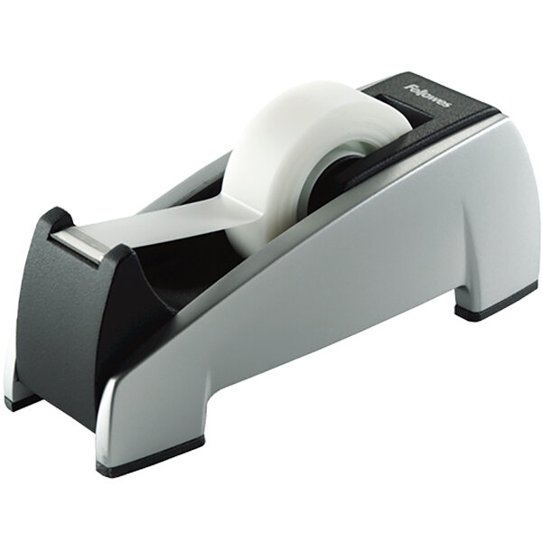 A black and silver Fellowes tape dispenser with a white core.