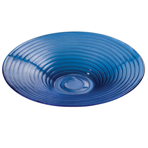 An American Metalcraft blue glass bowl with a ripple pattern.