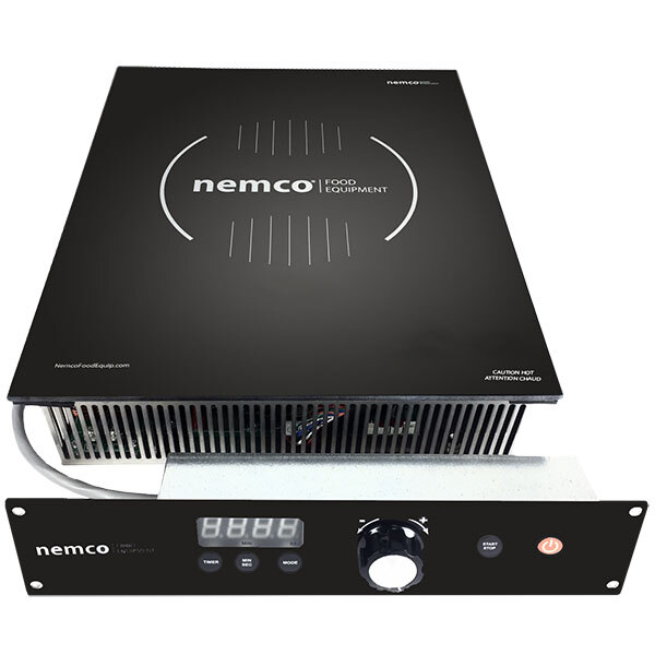 A Nemco Drop-In Induction Warmer with white remote controls.