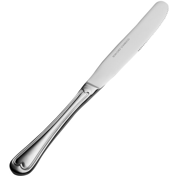 A silver knife with a solid handle.