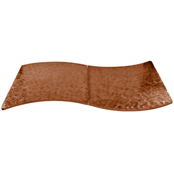 A brown aluminum Tablecraft serpentine swirl table cover with a curved surface.