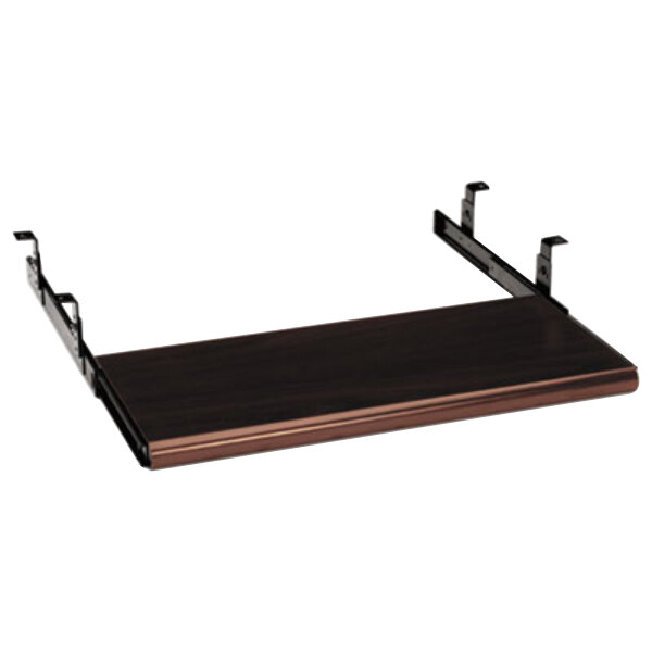 A mahogany HON sliding keyboard tray with black metal brackets.