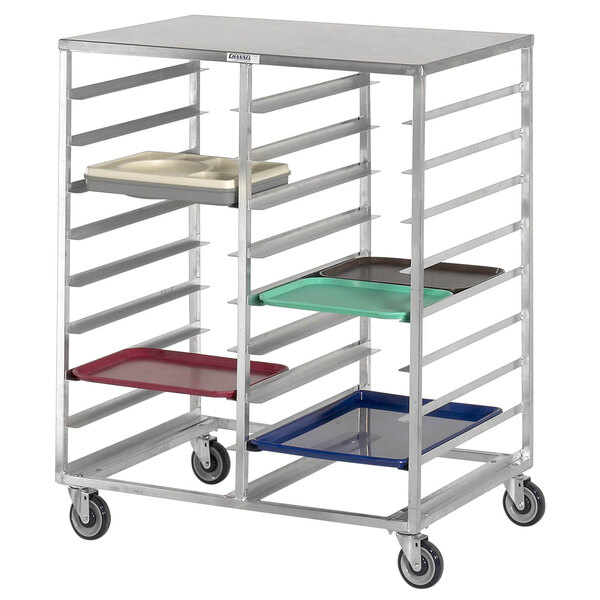 A Channel aluminum tray rack with several trays on it.
