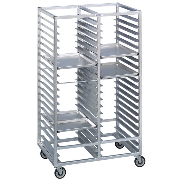 A metal sheet pan rack with four shelves on wheels.
