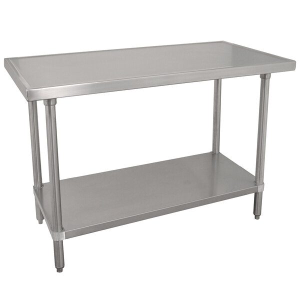 An Advance Tabco stainless steel work table with a galvanized shelf.