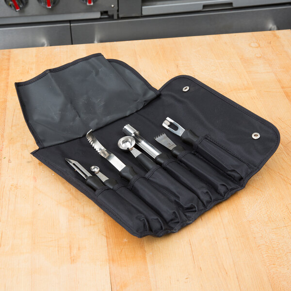 A Dexter-Russell garnishing tools set in a black case.