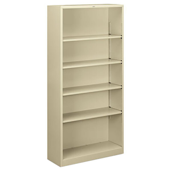 A putty metal bookcase with five shelves.