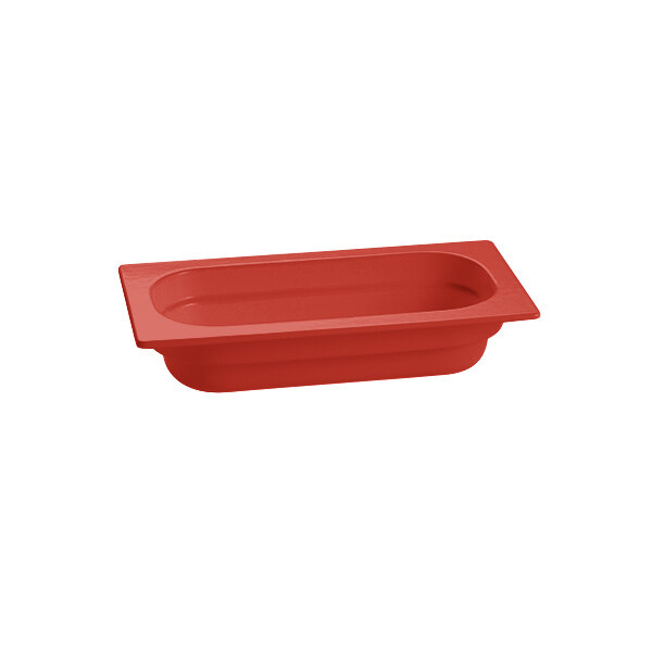 A red rectangular Tablecraft food pan with a rectangle bottom.