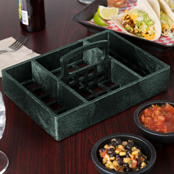 A black HS Inc. tabletop condiment organizer with bowls of salsa and a bottle on a table.