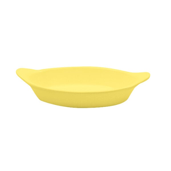 A yellow cast aluminum bowl with shell handles.