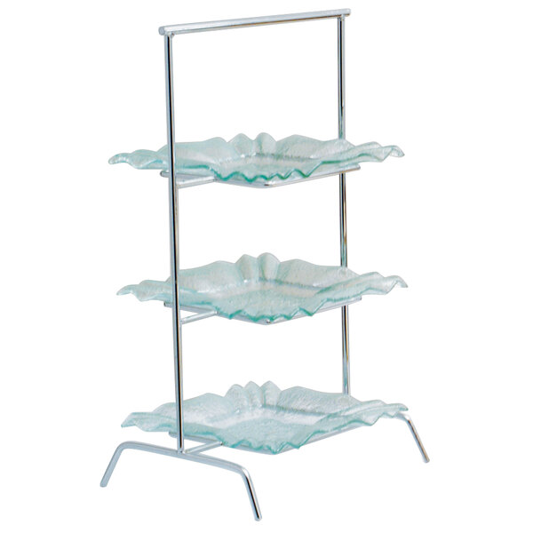 A Clipper Mill 3-tier metal display stand with glass trays.