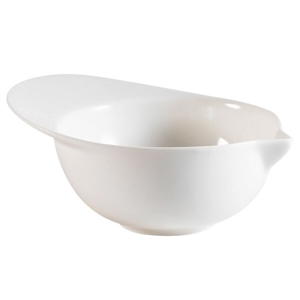 A CAC white porcelain bowl with a curved edge.