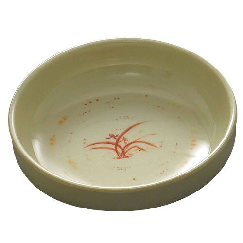 A white bowl with a red orchid design.