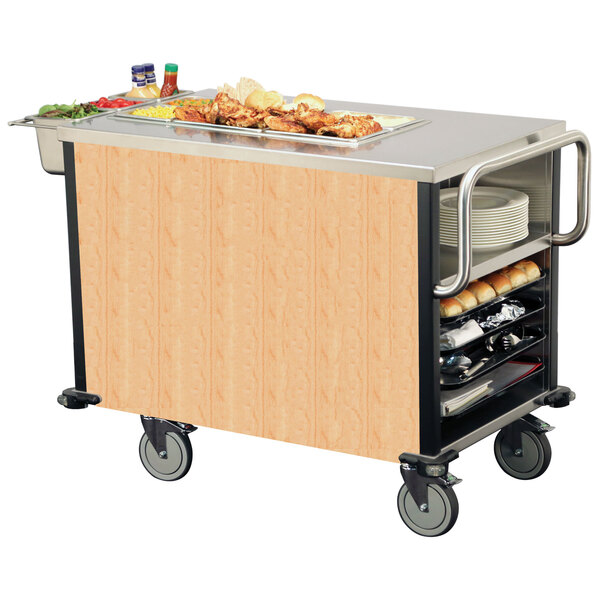 A Lakeside dining room meal serving system on a Lakeside food cart with a tray of food on it.