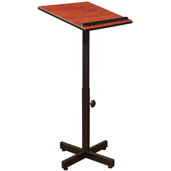 A wooden podium with a black pole and round knob.