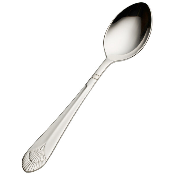 A close-up of the handle of a Bon Chef stainless steel teaspoon with a design on it.