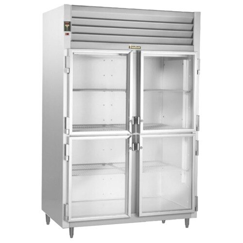 A Traulsen stainless steel reach-in refrigerator with two glass doors and shelves.
