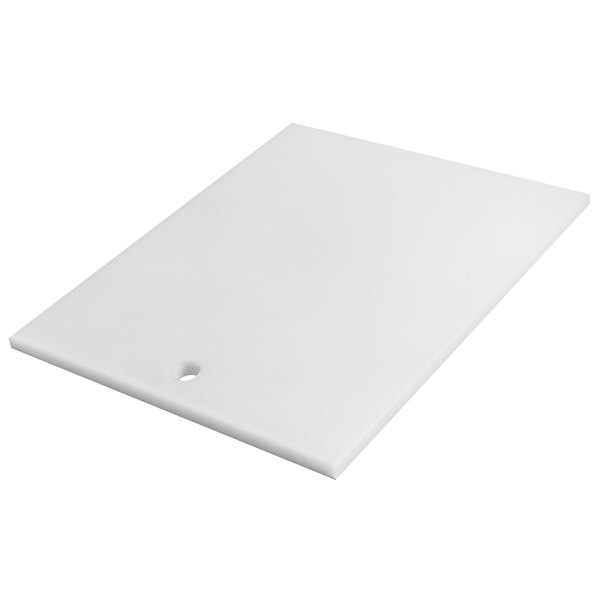 A white rectangular plastic sink cover with a hole.
