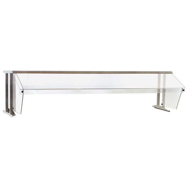 A stainless steel buffet shelf with a sneeze guard on metal legs.