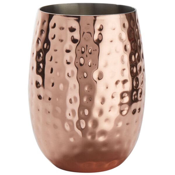 An American Metalcraft hammered copper Moscow Mule cup with a textured surface.