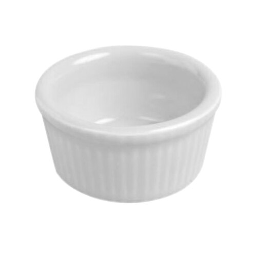 A Hall China bright white fluted ramekin with a white background.