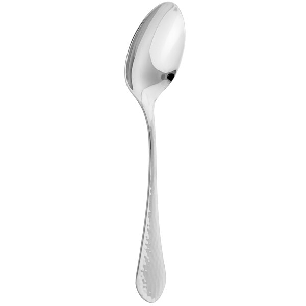 An Arcoroc stainless steel dinner spoon with a handle.