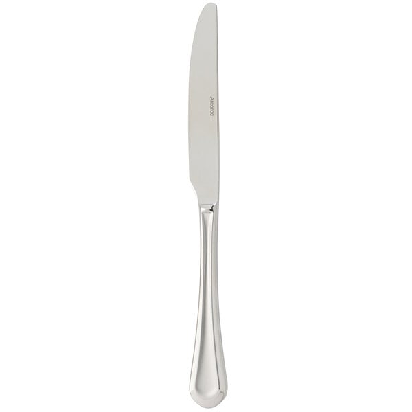An Arcoroc stainless steel dinner knife with a silver handle.