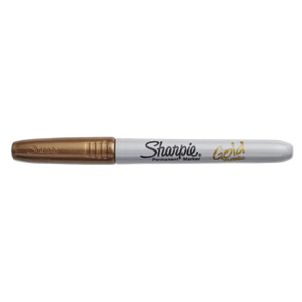 The tip of a Sharpie gold metallic permanent marker.