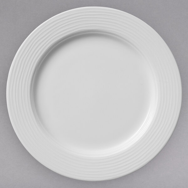 A white porcelain plate with a thin rim.