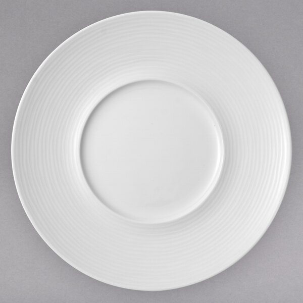 A white Villeroy & Boch porcelain plate with a circular rim.