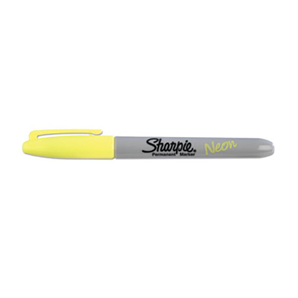 The cap of a Sharpie Neon Yellow Fine Point marker.