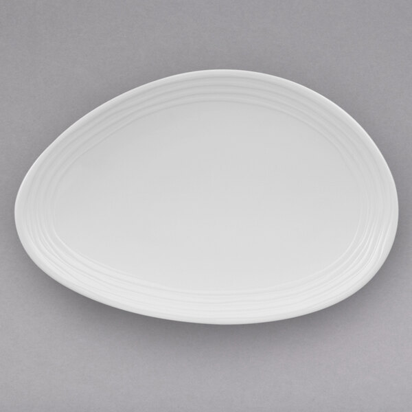A white Villeroy & Boch porcelain oval plate with a white rim.