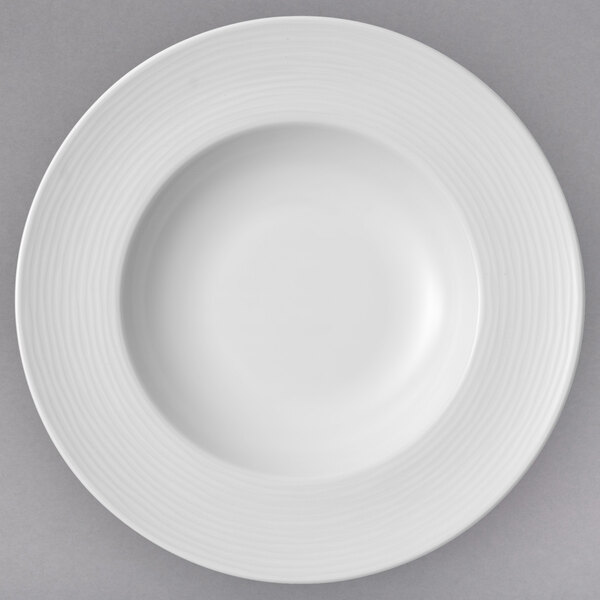 A white porcelain bowl with a rim.