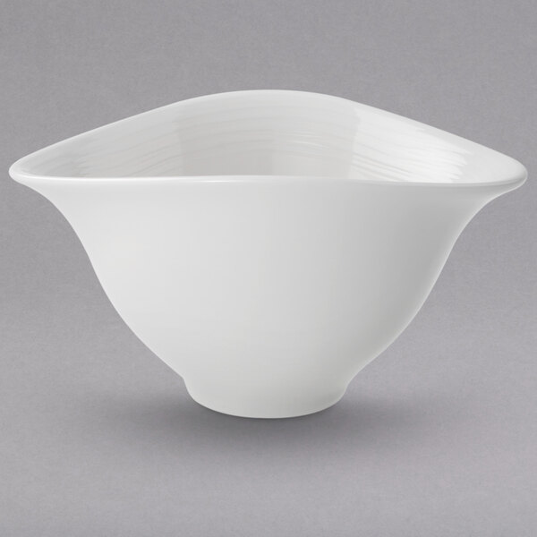 A Villeroy & Boch Sedona white porcelain bowl with a wavy edge.
