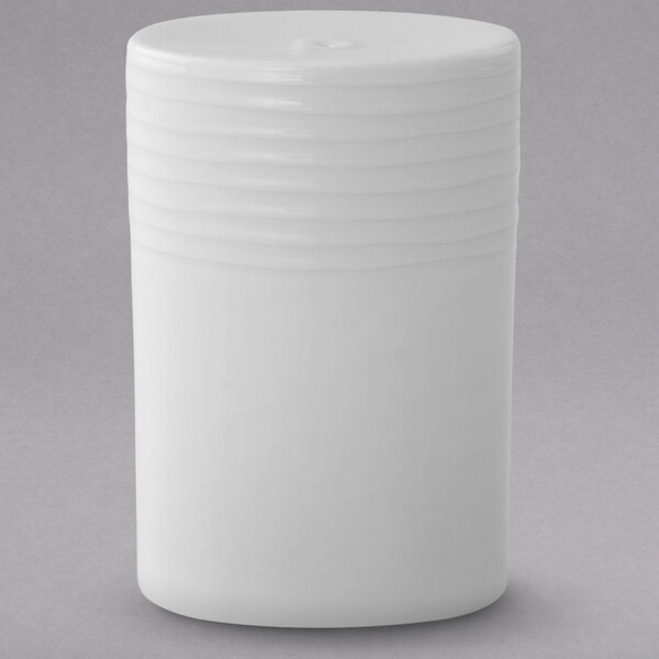 A white cylindrical Villeroy & Boch porcelain container with a white lid.