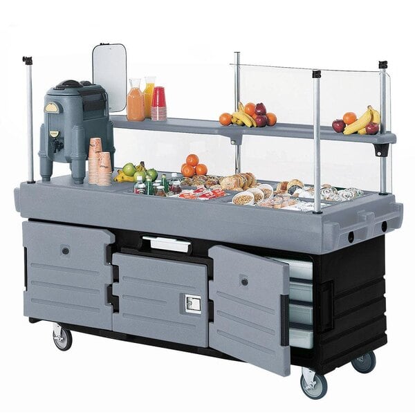 A Cambro CamKiosk black and gray food cart with 6 pan wells filled with food.