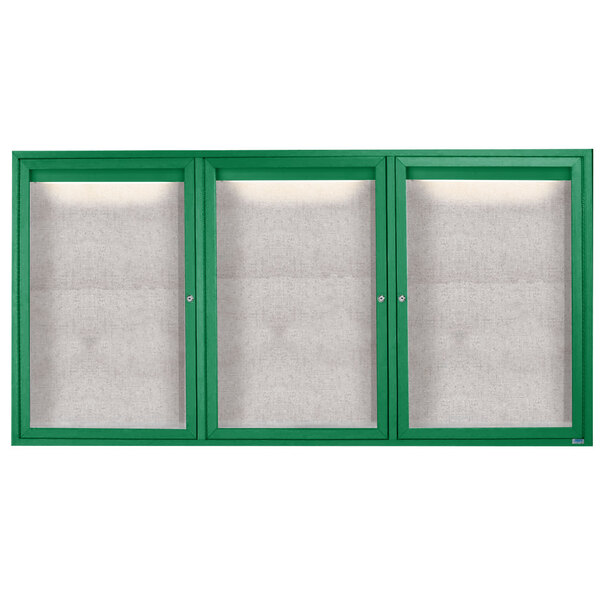 A green cabinet with three white doors with green frames.