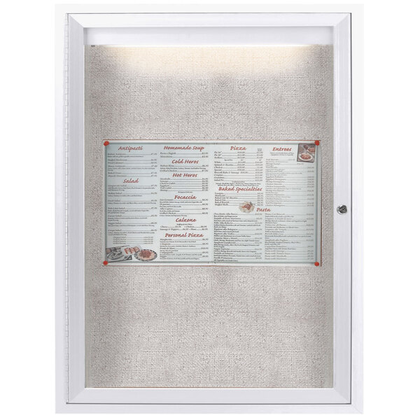 A white Aarco outdoor bulletin board with a menu inside.