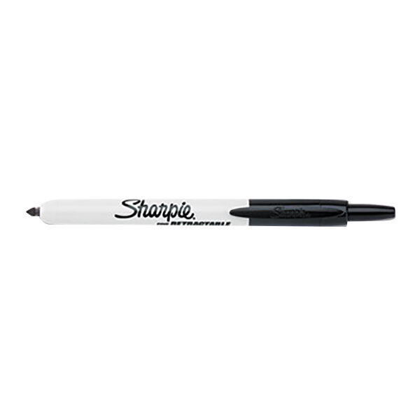 A close-up of a black Sharpie pen with the word "Sharpie" on it.