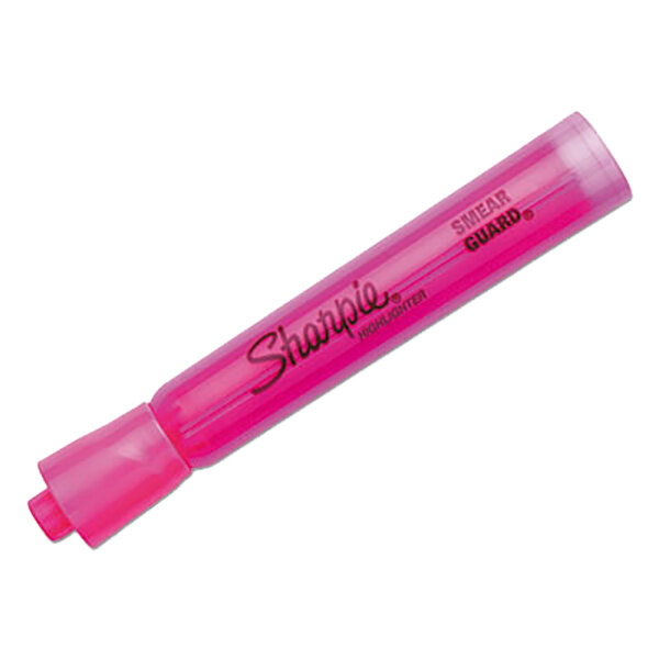 A close-up of a pink Sharpie highlighter with the word "Sharpie" on it.