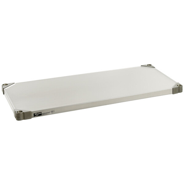 A white rectangular Metro Super Erecta stainless steel shelf.