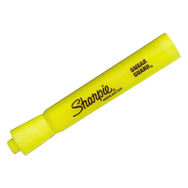 A close up of a Sharpie yellow highlighter pen with a chisel tip.