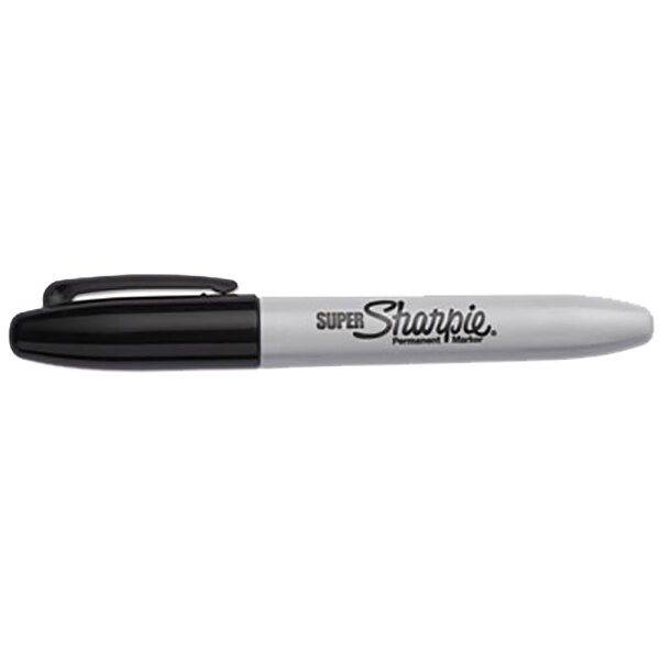 A close-up of a black Sharpie pen with the word "Sharpie" on it.