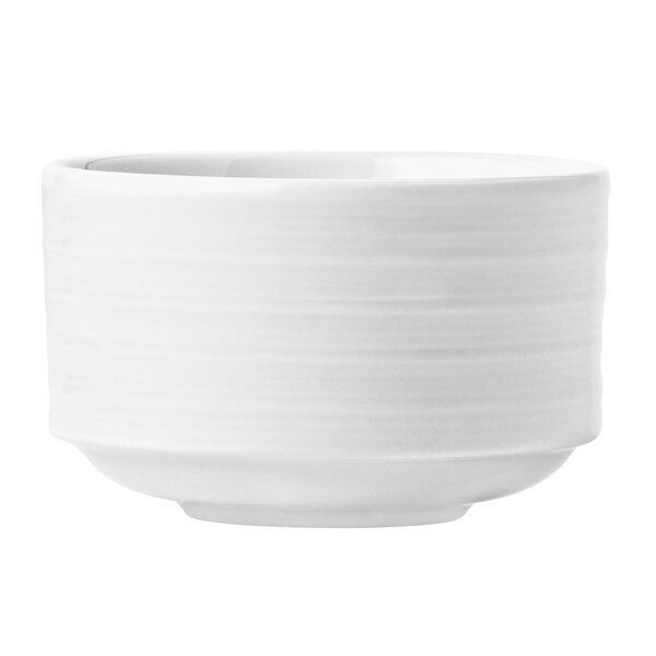 A Libbey Lunar Bright white porcelain bowl with a white rim.